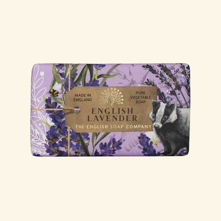 English Lavender soap bar with packaging featuring lavender and badger design on a beige background