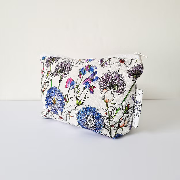 Floral-patterned pouch on a white background