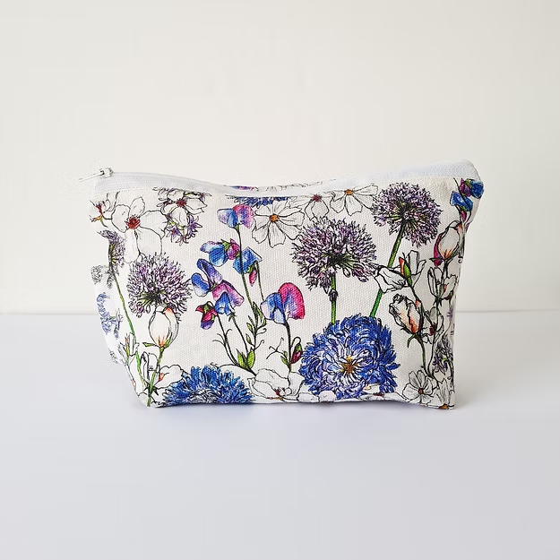 Floral-patterned pouch on a white background