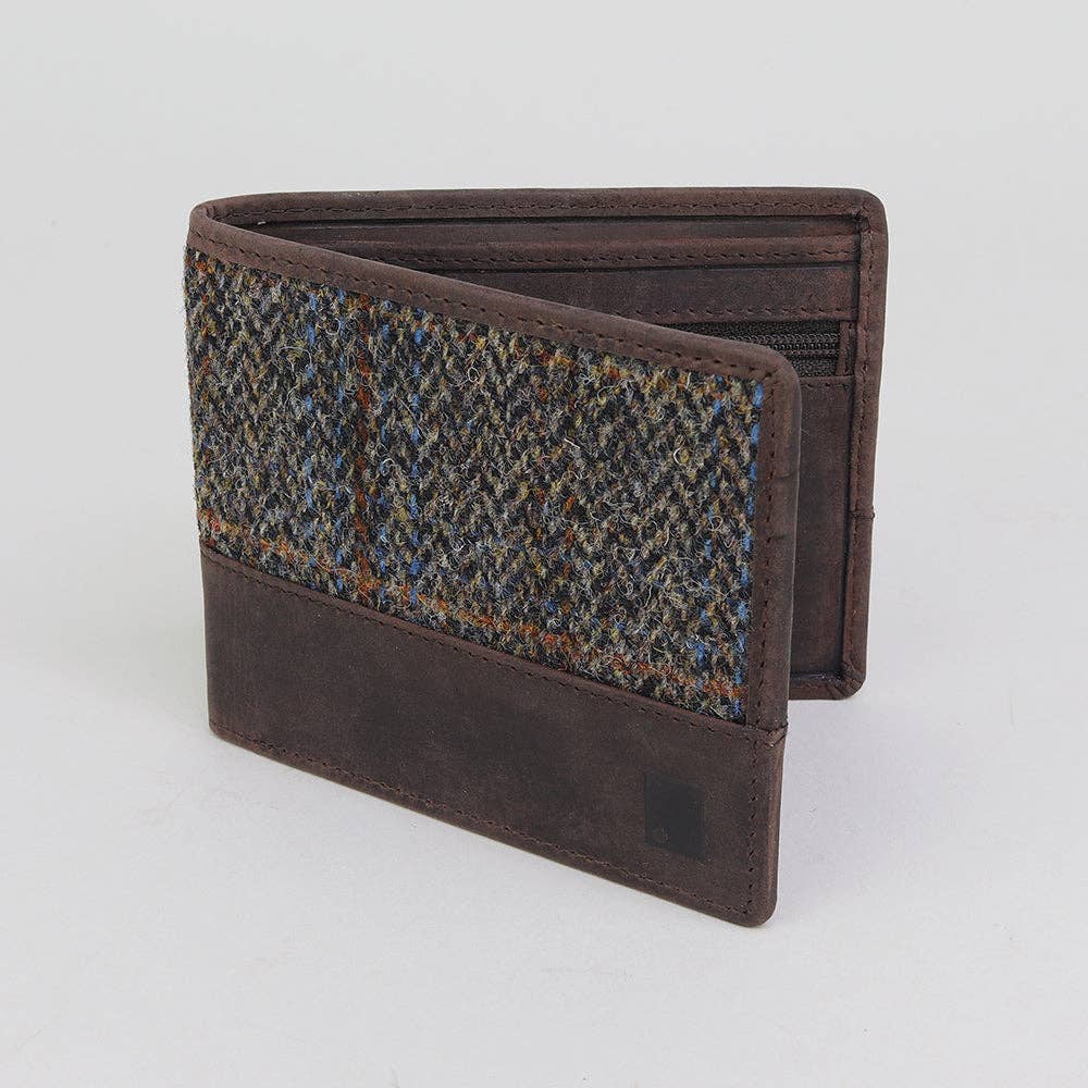 Brown wallet with patterned flap on a light gray background
