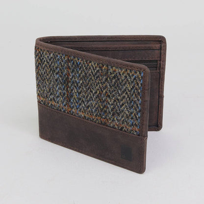 Brown wallet with patterned flap on a light gray background