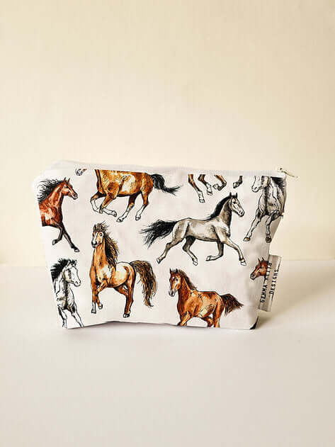Pouch with horse pattern on a beige background