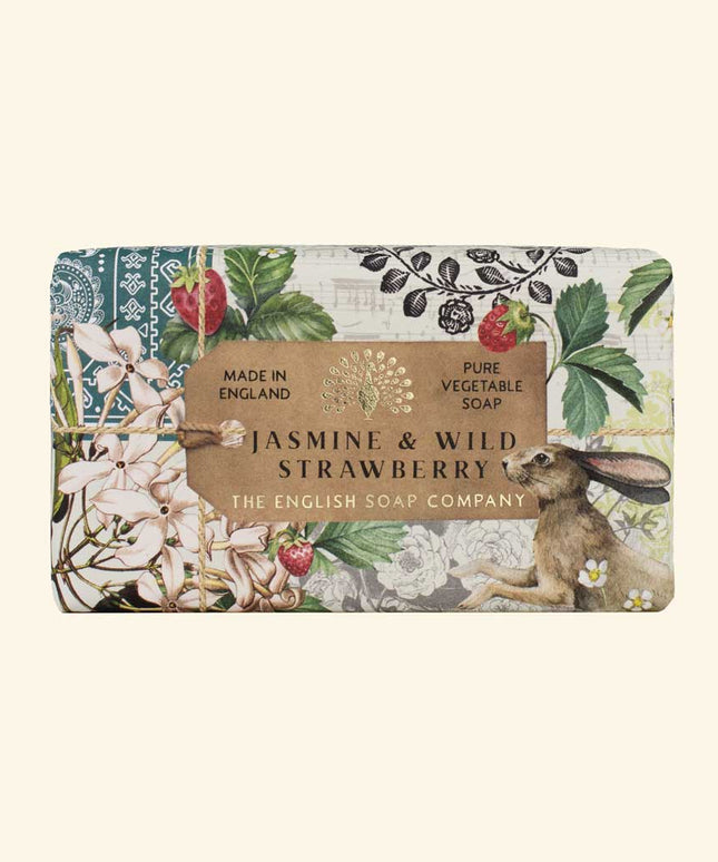 Soap bar with floral design and rabbit illustration on a white background