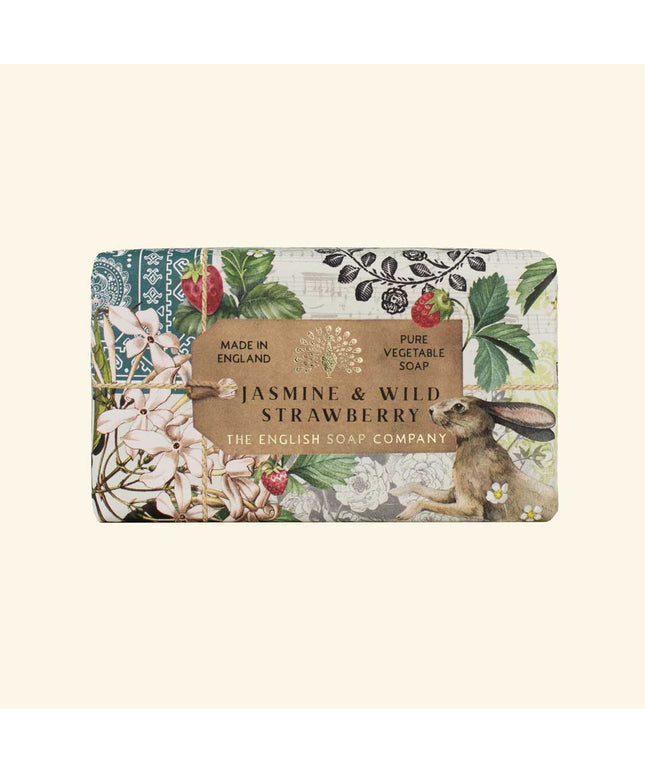 Soap bar with floral design and rabbit illustration on a white background