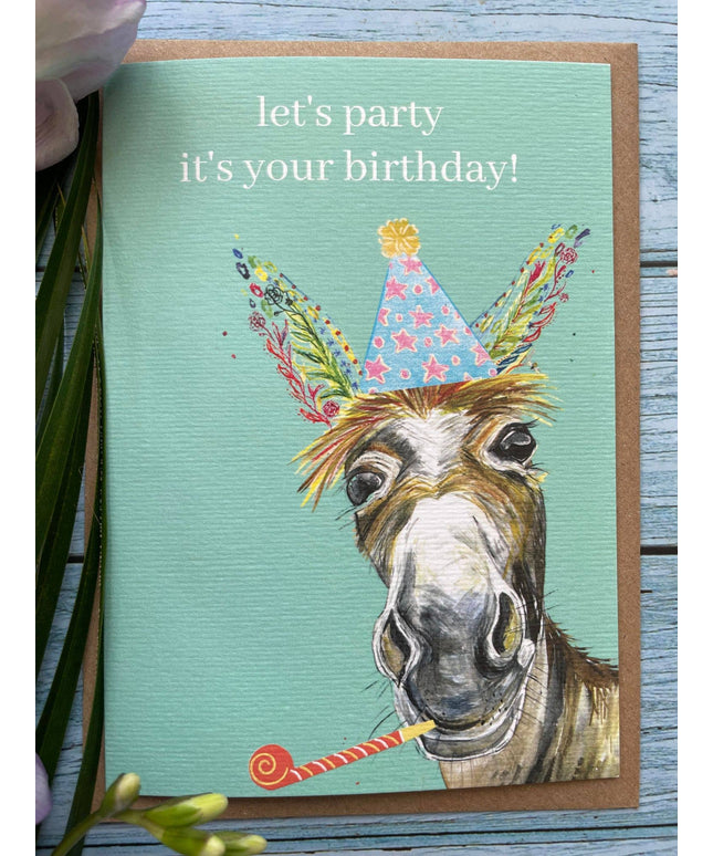 Birthday card with a donkey wearing a party hat and the text 'let's party it's your birthday!' on a teal background.