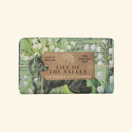 Soap bar with 'Lily of the Valley' design and branding on a beige background