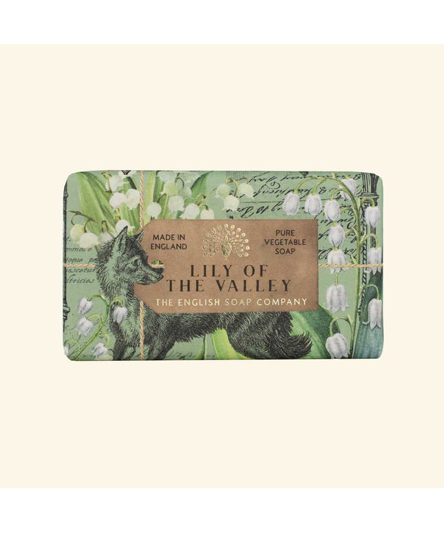 Soap bar with 'Lily of the Valley' design and branding on a beige background