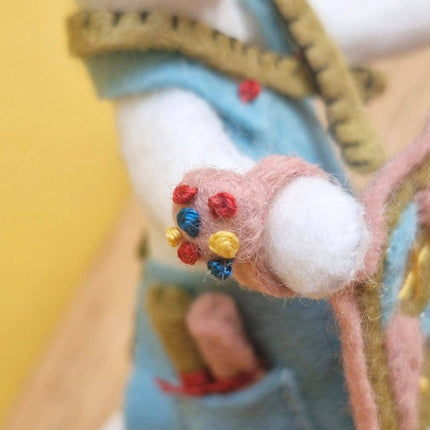 Close-up of a hand with a colorful bandage on a blurred background