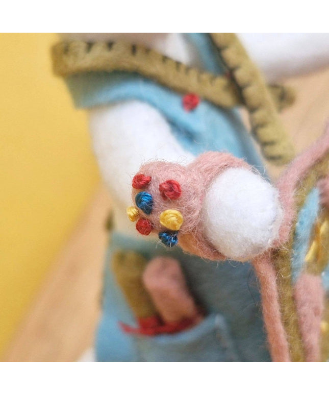 Close-up of a hand with a colorful bandage on a blurred background