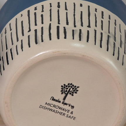 Close-up bottom view of a ceramic mug