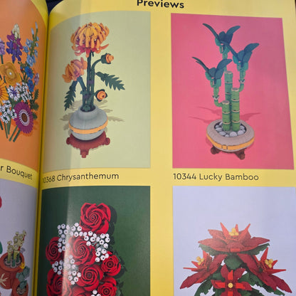 Floral designs on a book or catalog page with colorful backgrounds.