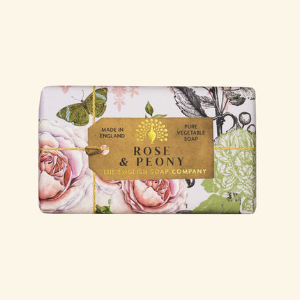 Bar of soap with floral design and 'Rose & Plony' label on a white background
