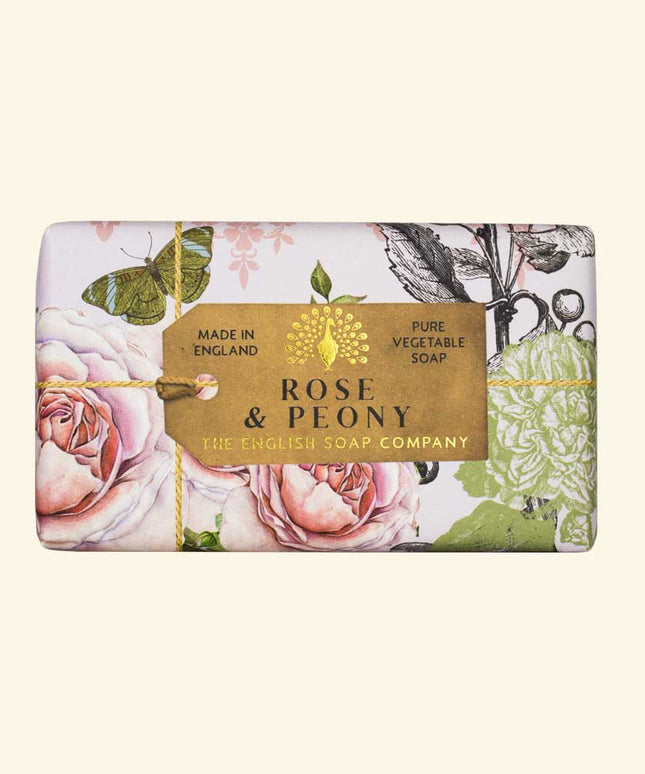 Bar of soap with floral design and 'Rose & Plony' label on a white background