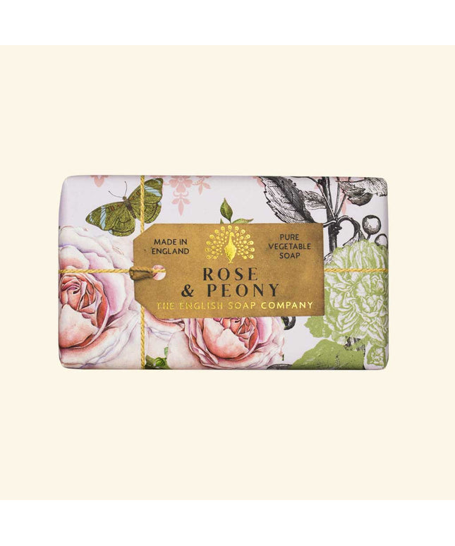 Bar of soap with floral design and 'Rose & Plony' label on a white background