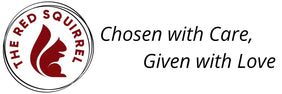 A logo and slogan on a white background: a circular red-and-white squirrel emblem with the words 'THE RED SQUIRREL' beside black text reading 'Chosen with Care, Given with Love'.