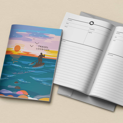 Travel logbook with a colorful cover and open to show lined pages on a beige background