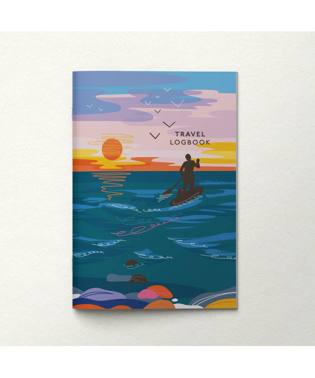 Travel logbook cover with a sunset over water illustration on a white background